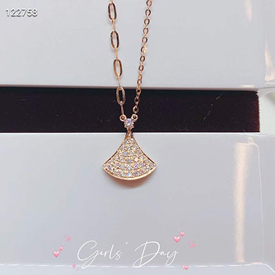 18K Gold Diamond Necklace with Small Skirt Pendant Design