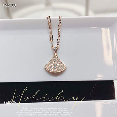 18K Gold Diamond Necklace with Small Skirt Pendant Design